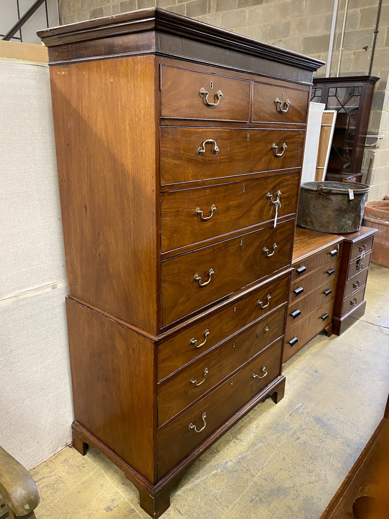 A George III mahogany secretaire chest on chest, width 112cm, depth 61cm, height 189cm